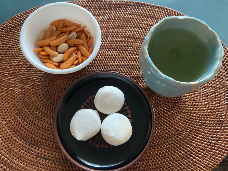 A relaxing tea-time moment with traditional Japanese sweets and green tea.