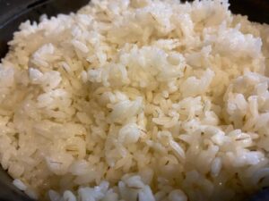 Close-up of freshly cooked Japanese rice with a fluffy texture.